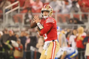 Brock Purdy launches a deep ball during the October 2, 2025, thriller at SoFi Stadium